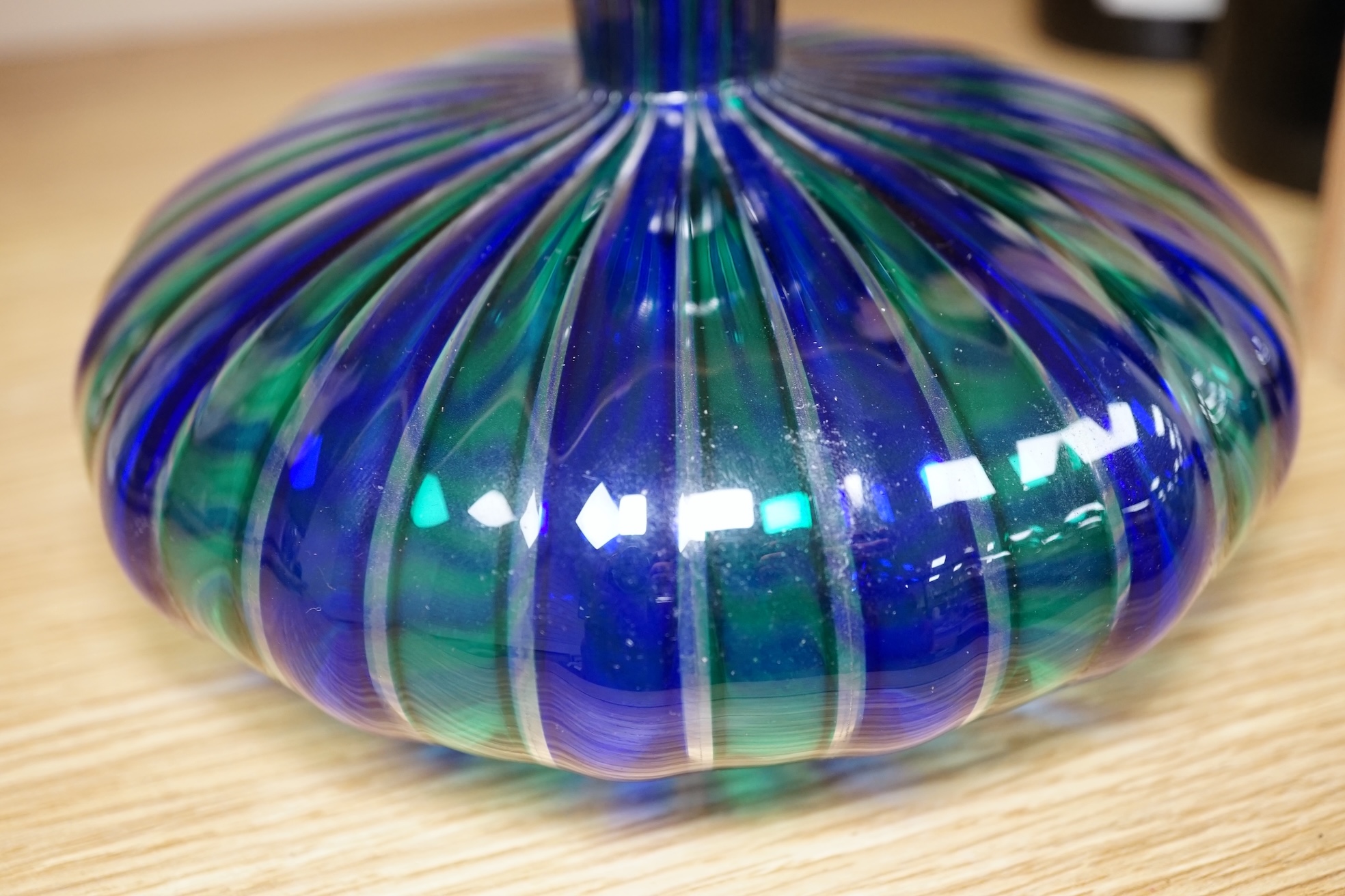 A Murano cane art glass decanter and stopper by Orlando Zennaro, signed to the base, 17cm high. Condition - good